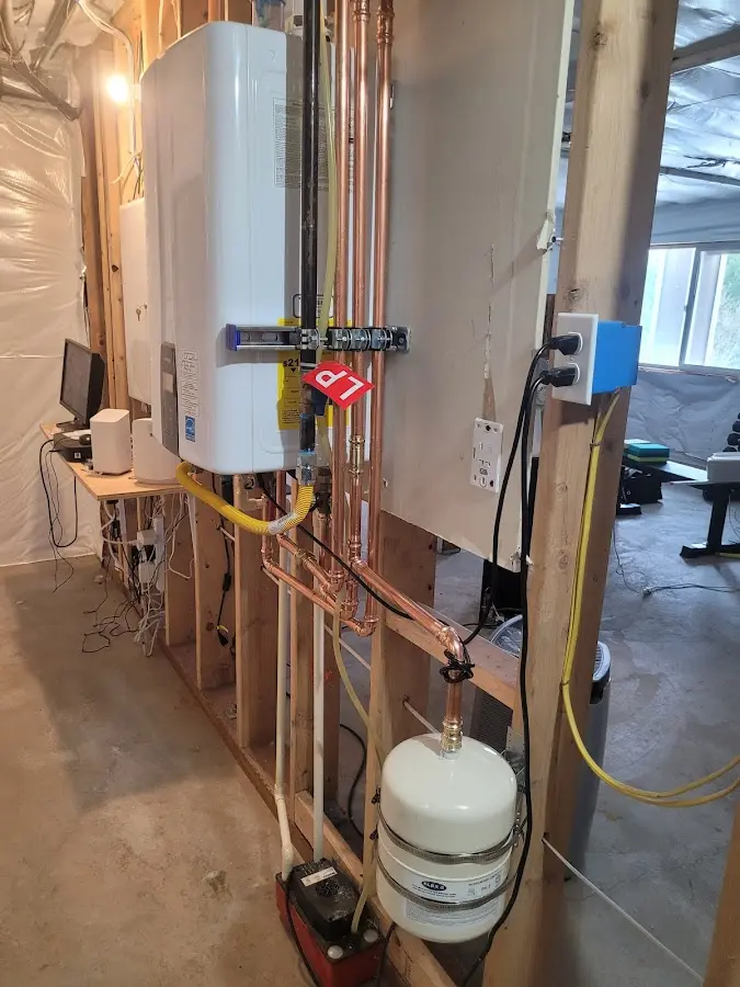Licensed plumber repairing a kitchen sink in Leeds